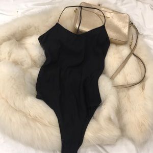 Black backless bodysuit by Forever 21